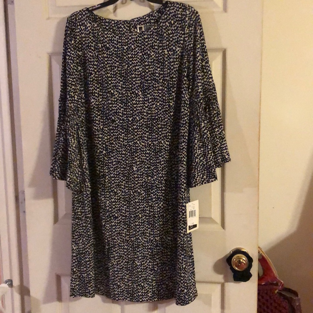 Women’s Black and white dress. Size 14W. 3/4 length sleeves. Knee length